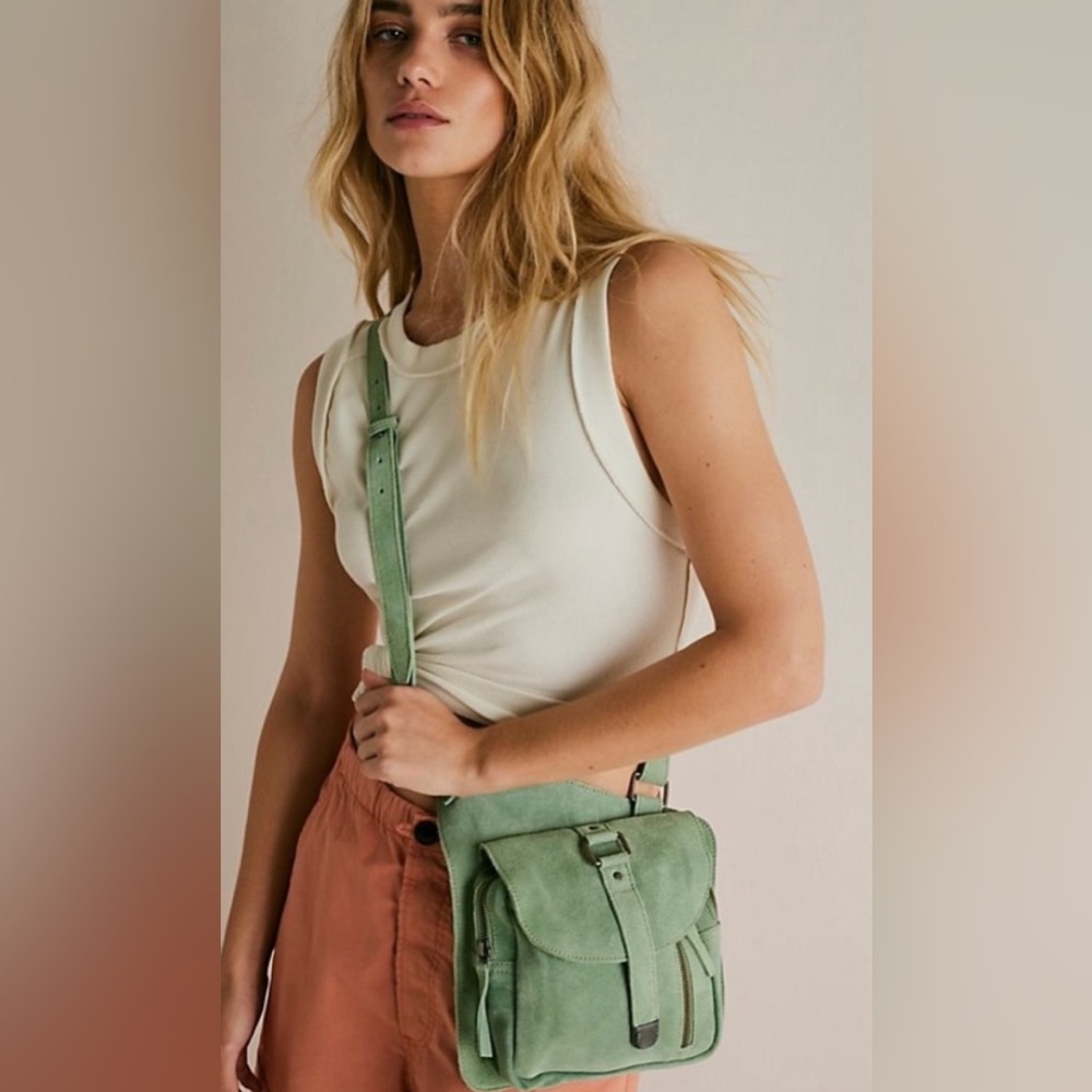 NWOT Free People Cornell Sea Serpent bag. Sling style, suede, adjustable strap